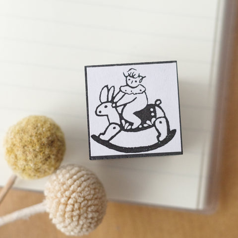 Kocka Stamp - Riding rabbit
